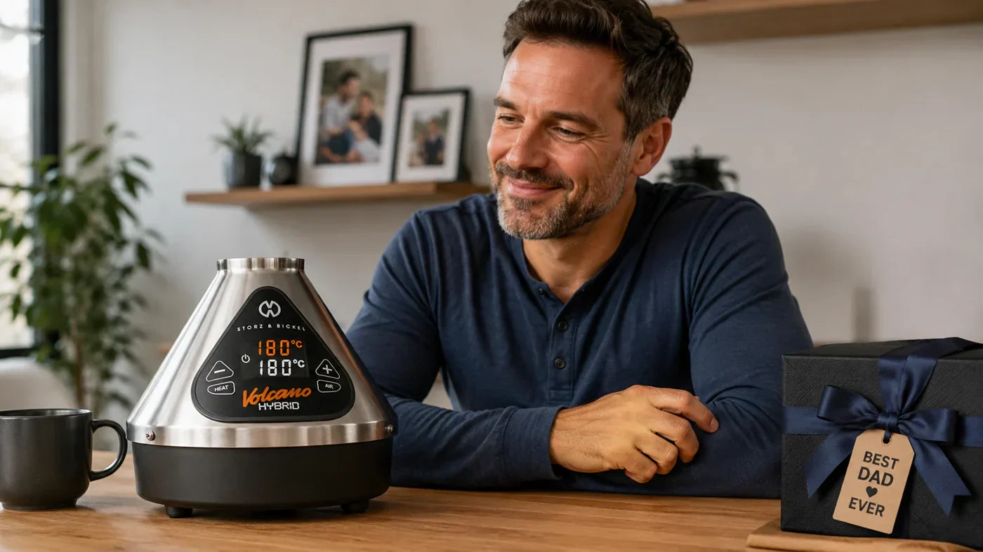 Man looking at Storz & Bickel Volcano on table